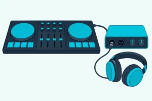 A DJ controller on a desk beside a compact audio interface, with a pair of headphones plugged into the interface