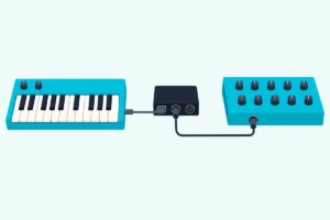 A small USB MIDI host box on a desk linking a USB keyboard to a synth module with a five-pin MIDI cable