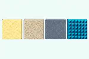 Four acoustic panel material samples on a table: fiberglass, rockwool, PET felt and pyramid foam