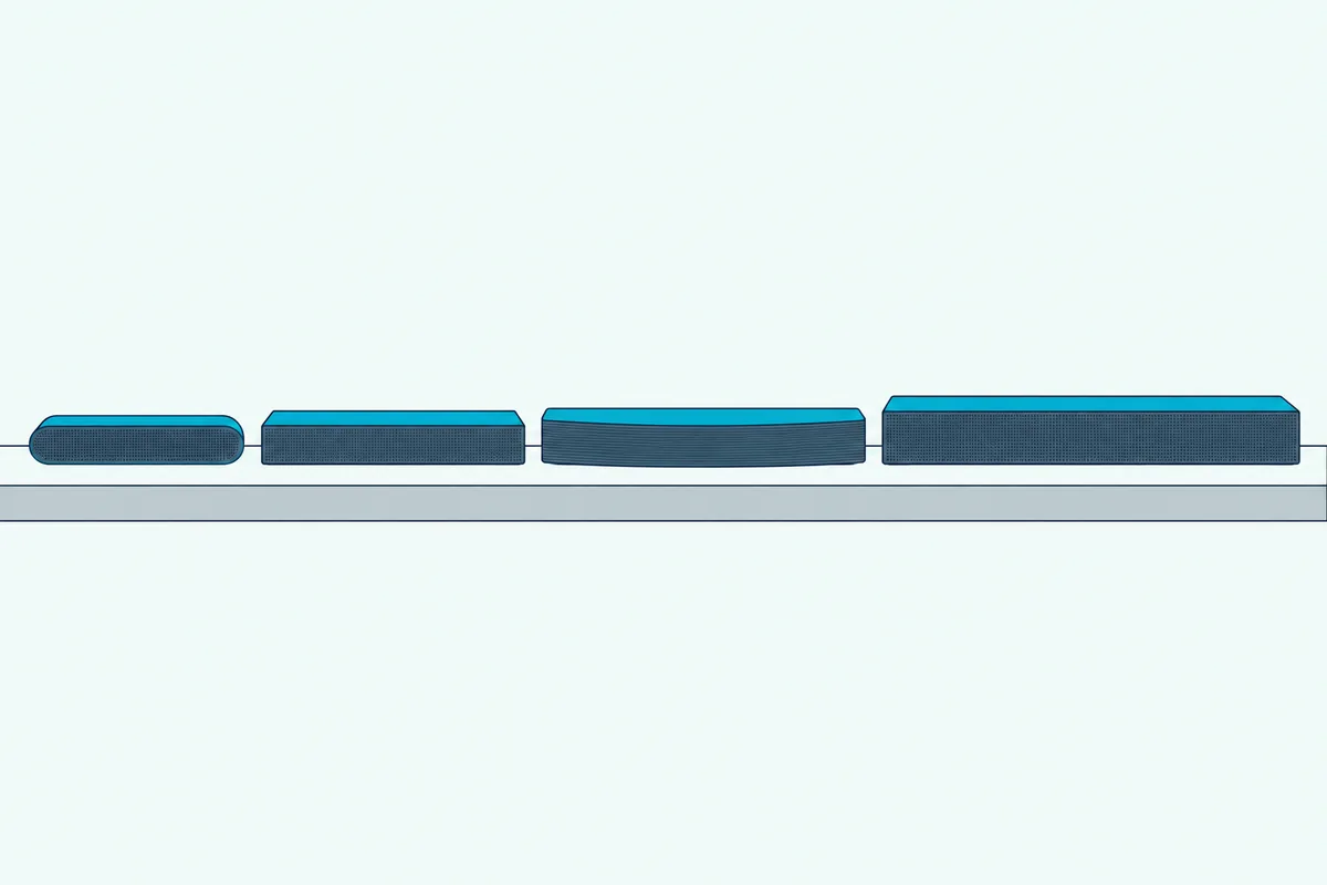 Four slim soundbars of different lengths and shapes side by side on a long shelf