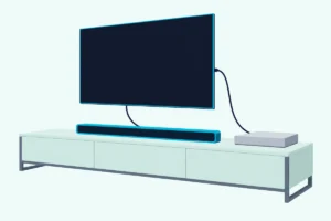 Plain game console box, wall-mounted TV and soundbar on a low wooden stand, wired together with two HDMI cables