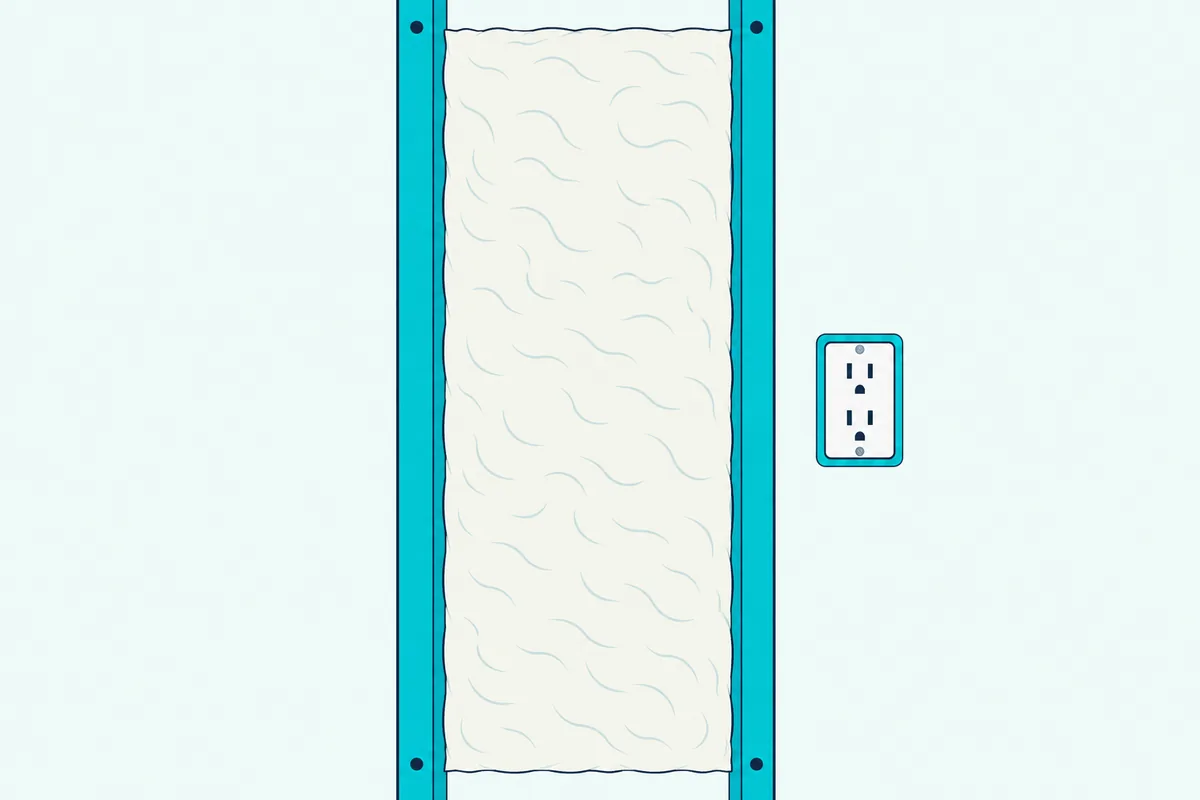 A stud bay completely filled by a wool batt with no gaps, and an outlet box sealed with a thin line around its edge