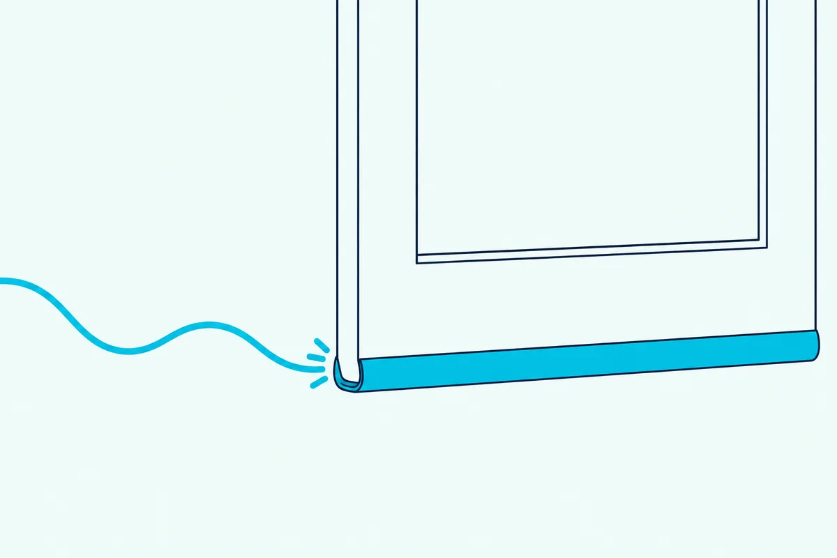 A slim slide-on seal sitting over the bottom edge of a door like a sleeve, with a sound wave stopping at it