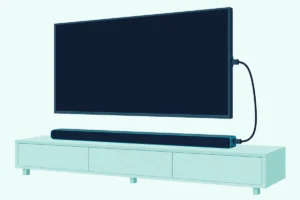 Slim soundbar on a low console with one HDMI cable running up to the side of a wall-mounted TV with a blank screen