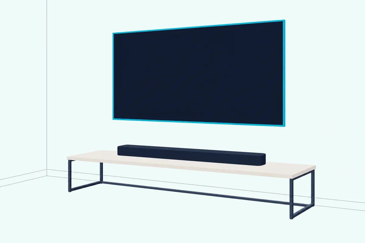 Slim soundbar on an open low TV stand under a wall-mounted TV with a blank screen and clear space above the bar