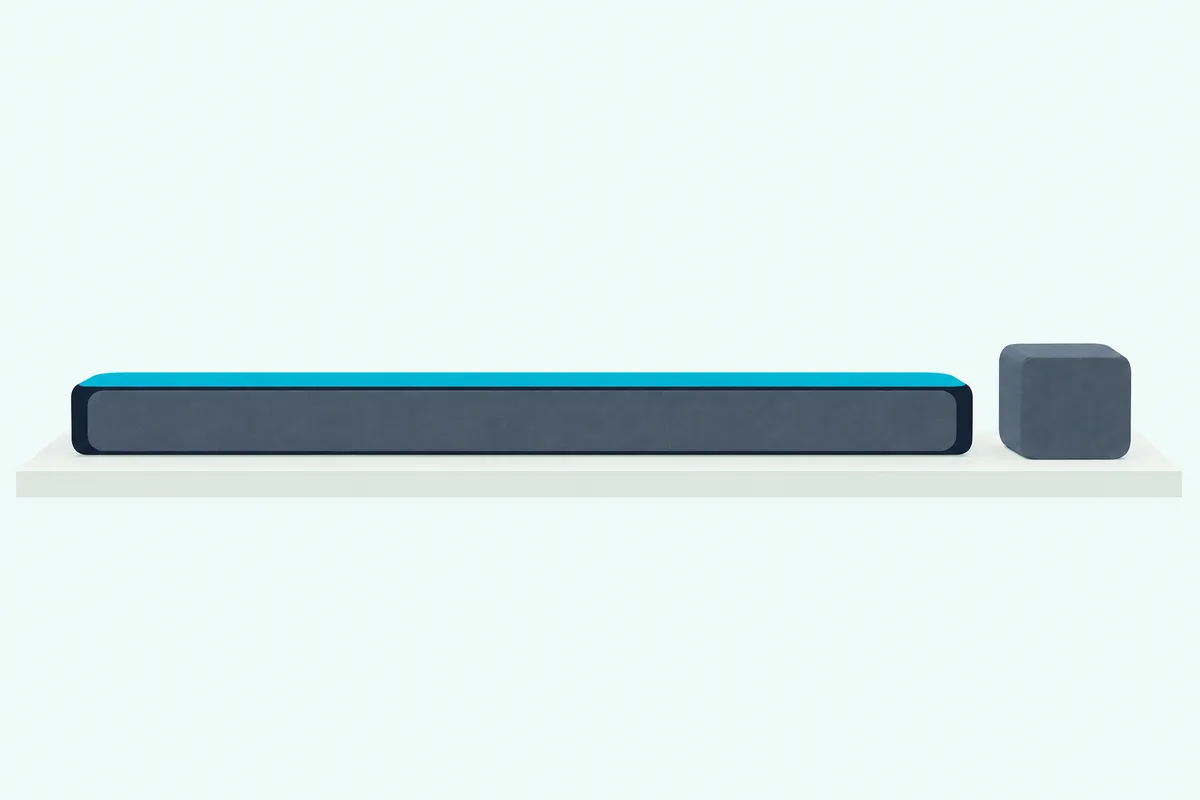 Long soundbar on a low wooden shelf with a small fabric-covered cube speaker beside it