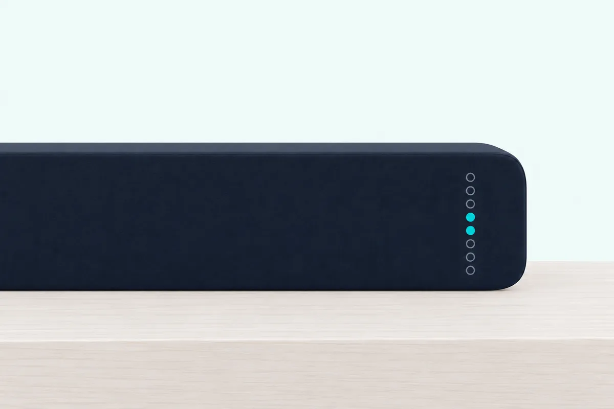 Vertical row of small indicator lights on the front corner of a soundbar, the two middle ones lit