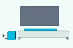 Soundbar on a wooden console under a TV with a blank screen and one box subwoofer on the floor beside it