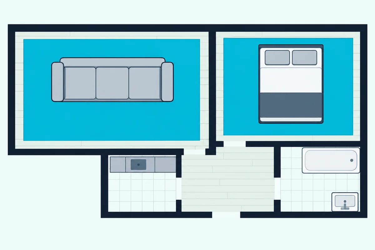 Top-down apartment floor plan with large rugs covering most of the living room and bedroom, the kitchen and bath bare