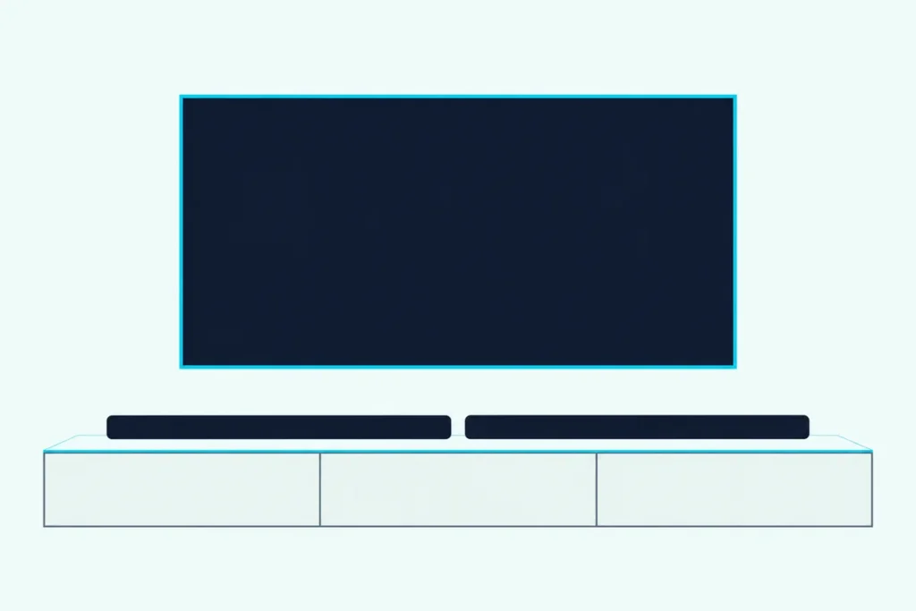 Two slim soundbars side by side on a light wooden console under a wall-mounted TV with a blank screen