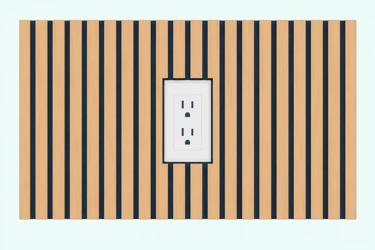Wood slat acoustic panel with a rectangular cutout fitted around a white electrical outlet box and a plastic box extender